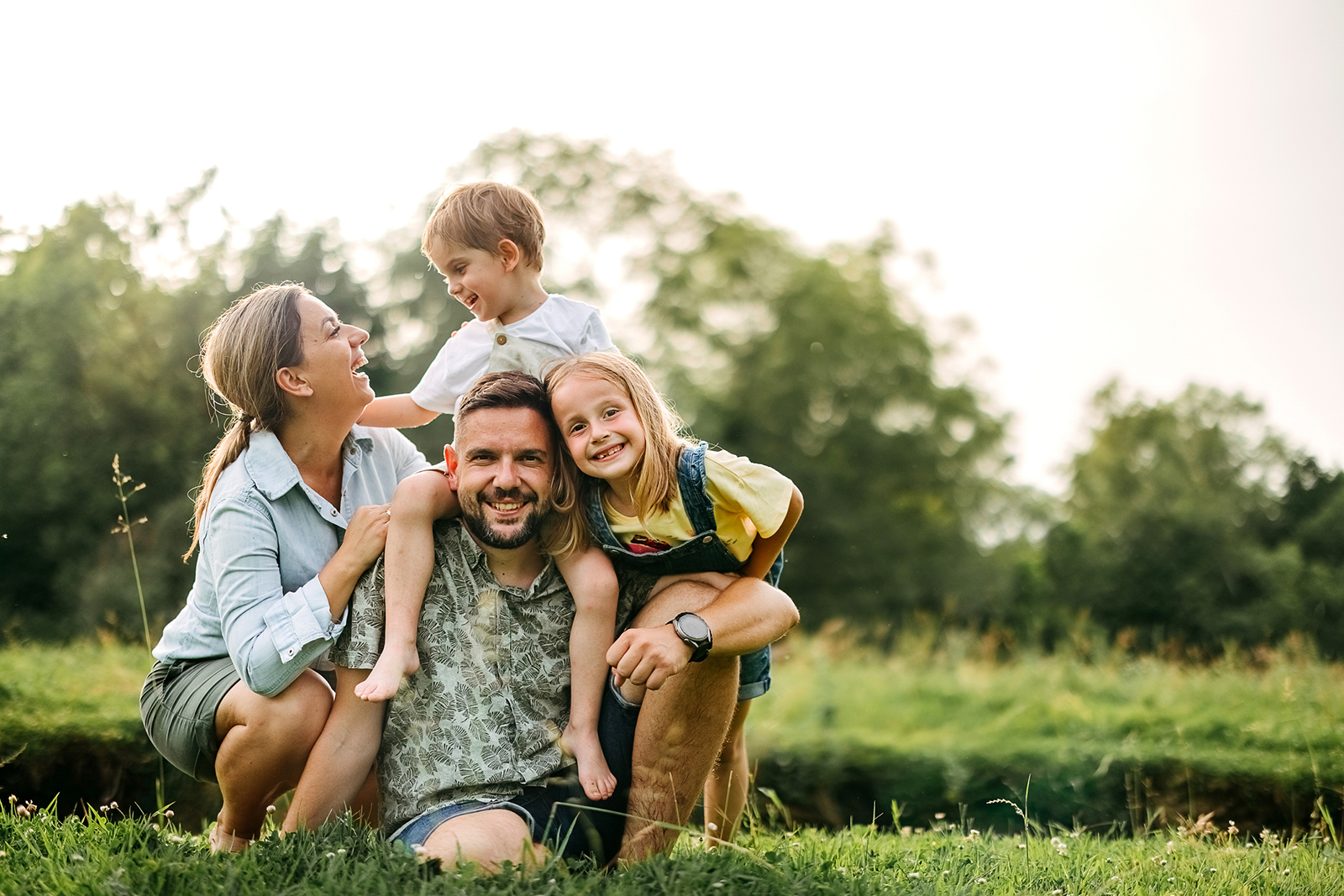 Portrait of a happy family in the forest