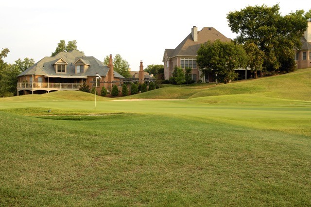 Homes beside a golf course near Adams Pointe Village
